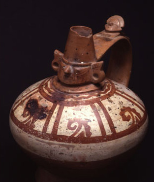 Vaso biconico con collo cefalomorfo  VII – X sec. d.C. (Lambayeque) 