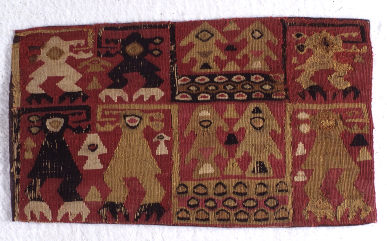 Textile fragment representing stylised birds and rays