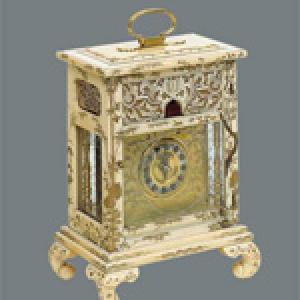 Orologio da tavolo in avorio con piante e animali delle quattro stagioni 