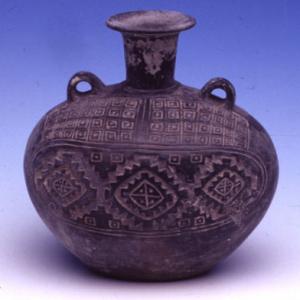 Oval vase with engraved geometric decoration