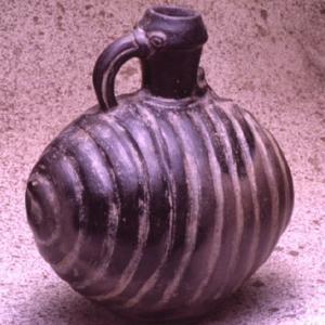 Ovoid vessel with chamber made up of coiled coils of a snake