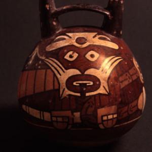 Globular vase with bridge handle