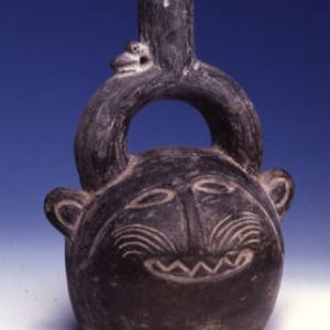 Globular vase shaped like a feline’s head, XV-XVI sec. A.D (Chimù-Inca)