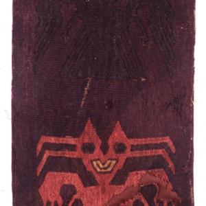 Fragment of fabric representing two bat-demons